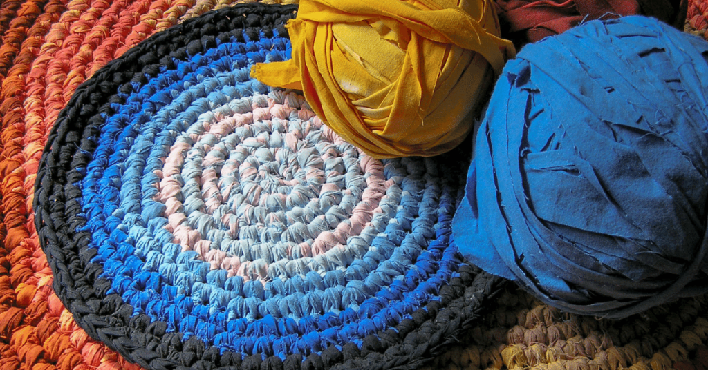 Colourful crochet rag rugs in sunlight