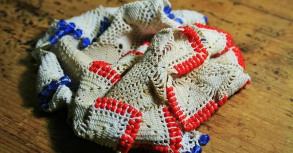 Hang doilies over the red shiplap wall