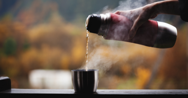 Pouring Hot Tea from a Thermos
