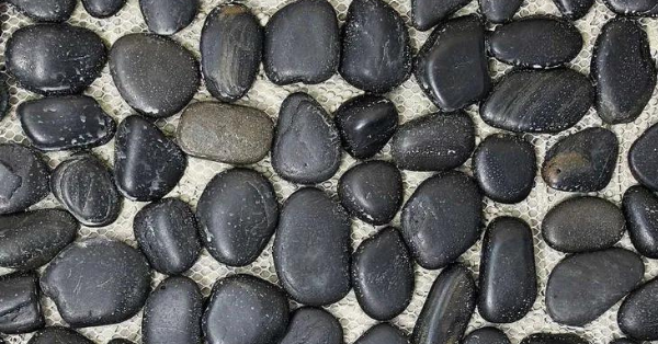 Stick stones on the red shiplap walls