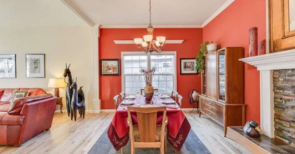 Use red shiplap wall above the fireplace