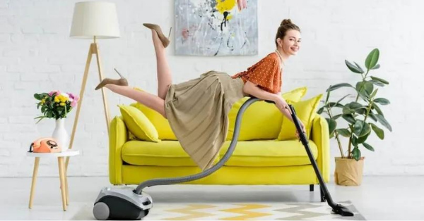 girl vacuuming carpet