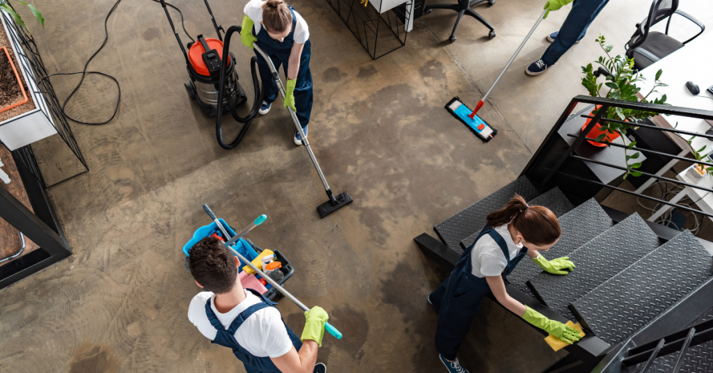 top view of cleaning company team cleaning modern office